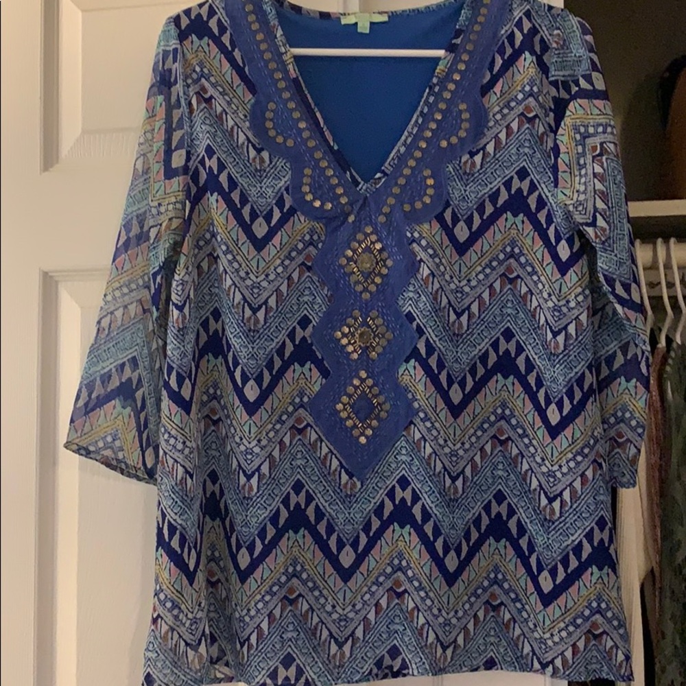 Royal blue blouse with brass detail neckline
